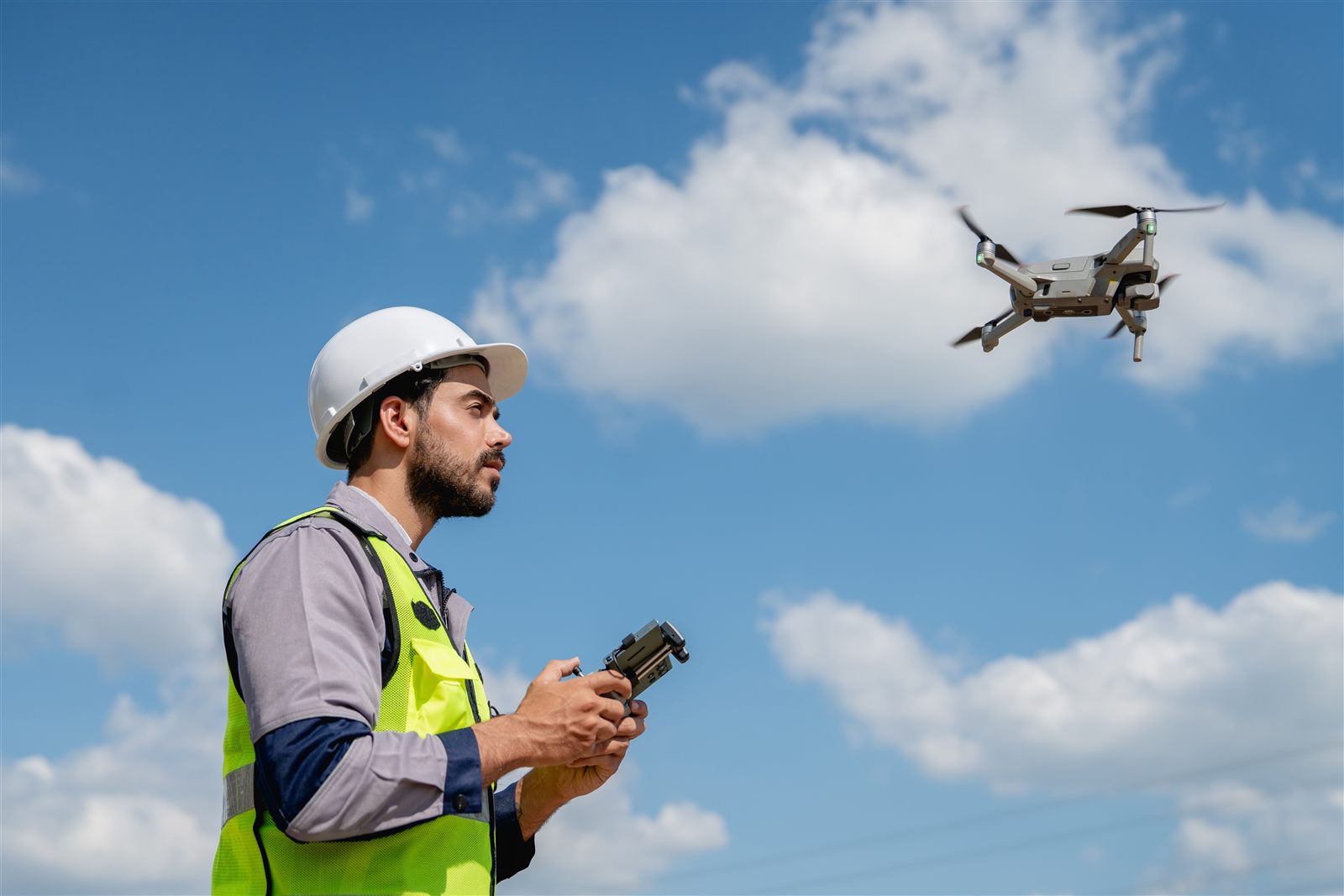 Drone pilot working outdoors